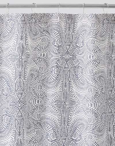 Andanza Shower Curtain featuring a delicate pattern created using a stippling technique in blue on white
